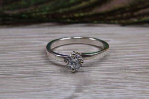 Silver solitaire twist style ring set with beautiful round Diamond white C Z, birthstone for April,ideal as promise, engagement