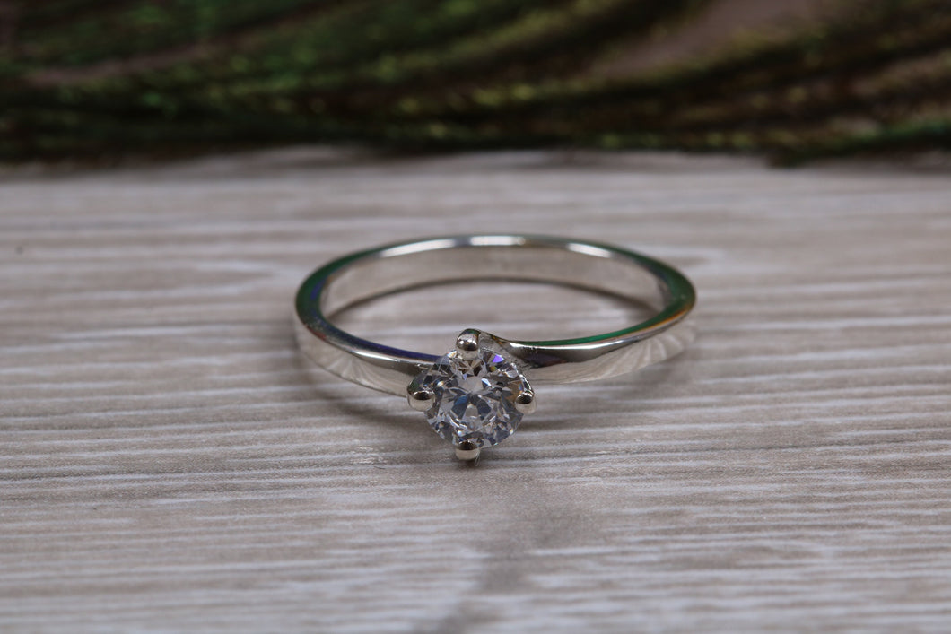 Silver solitaire twist style ring set with beautiful round Diamond white C Z, birthstone for April,ideal as promise, engagement