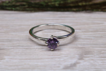 Load image into Gallery viewer, Silver solitaire twist style ring set with beautiful round Amethyst C Z
