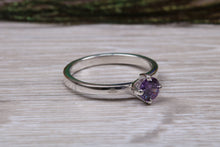 Load image into Gallery viewer, Silver solitaire twist style ring set with beautiful round Amethyst C Z