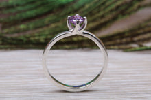 Load image into Gallery viewer, Silver solitaire twist style ring set with beautiful round Amethyst C Z