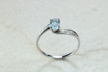 Load image into Gallery viewer, Blue topaz and diamond set twist ring. 9ct White gold with real diamonds and real topaz