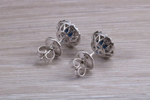 Load image into Gallery viewer, One carat each Blue Sapphire and Diamond Halo set Earrings