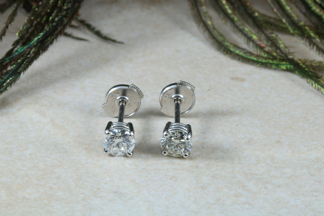One carat Diamond set Solitaire Stud Earrings