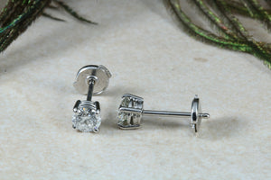 One carat Diamond set Solitaire Stud Earrings