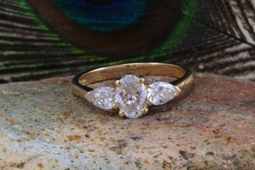 One carat Certified Oval and Pear Drop cut Diamond Trilogy Ring