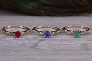 Dainty set of Three Tanzanite, Ruby and Emerald set Rings
