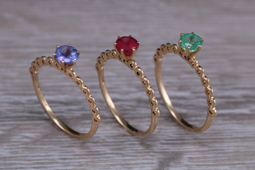 Dainty set of Three Tanzanite, Ruby and Emerald set Rings