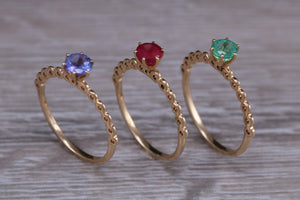 Dainty set of Three Tanzanite, Ruby and Emerald set Rings
