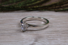 Load image into Gallery viewer, Silver solitaire twist style ring set with beautiful round Diamond white C Z, birthstone for April,ideal as promise, engagement