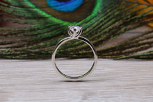 Load image into Gallery viewer, Silver solitaire twist style ring set with beautiful round Diamond white C Z, birthstone for April,ideal as promise, engagement