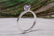 Load image into Gallery viewer, Silver solitaire twist style ring set with beautiful round Amethyst C Z