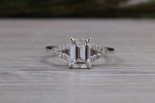 One carat Emerald cut Moissanite Diamond with Natural Diamonds set Ring
