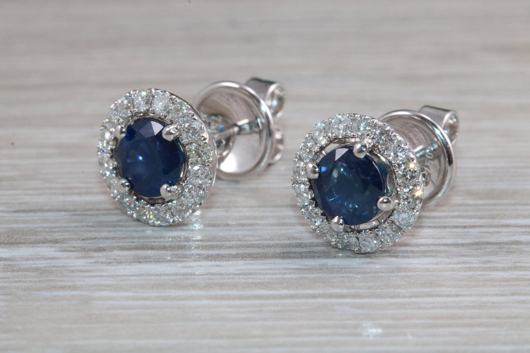 One carat each Blue Sapphire and Diamond Halo set Earrings