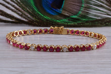 Load image into Gallery viewer, The Ultimate Ruby and Diamond set line bracelet, all natural non treated Rubies with D VVS1 grade natural diamonds set in 18ct yellow gold