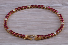 Load image into Gallery viewer, The Ultimate Ruby and Diamond set line bracelet, all natural non treated Rubies with D VVS1 grade natural diamonds set in 18ct yellow gold