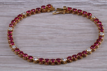 Load image into Gallery viewer, The Ultimate Ruby and Diamond set line bracelet, all natural non treated Rubies with D VVS1 grade natural diamonds set in 18ct yellow gold