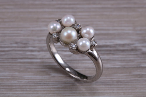 Diamond and Pearl set Platinum Ring