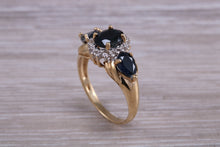 Load image into Gallery viewer, Beautiful Blue Sapphire and Diamond cluster dress ring, dark blue Sapphire with top white grade diamonds set in 9ct Yellow gold