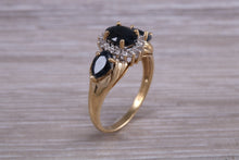 Load image into Gallery viewer, Beautiful Blue Sapphire and Diamond cluster dress ring, dark blue Sapphire with top white grade diamonds set in 9ct Yellow gold