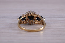 Load image into Gallery viewer, Beautiful Blue Sapphire and Diamond cluster dress ring, dark blue Sapphire with top white grade diamonds set in 9ct Yellow gold