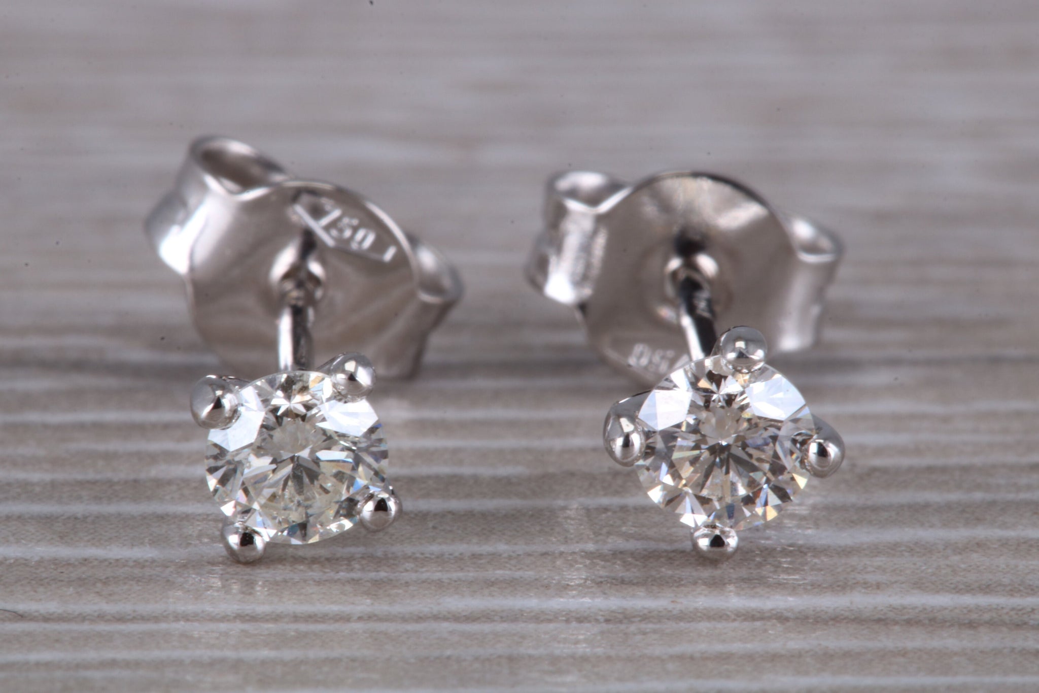Half carat on sale stud earrings