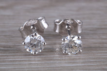 Load image into Gallery viewer, Half carat Diamond Solitaire set 18ct White Gold Stud Earrings