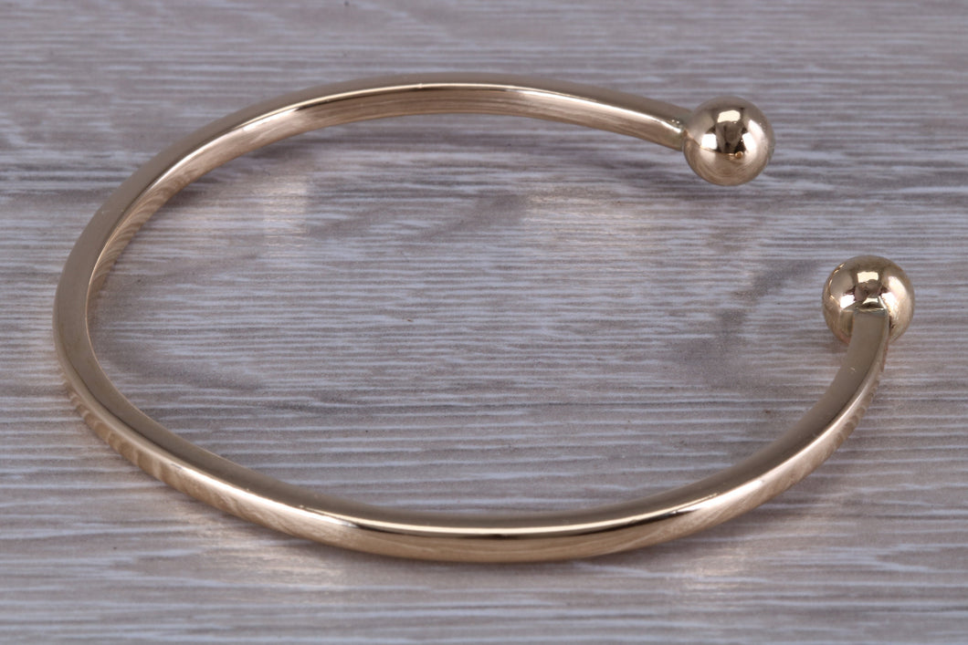 Round Profile Torque Bangle, Made from Solid Yellow Gold