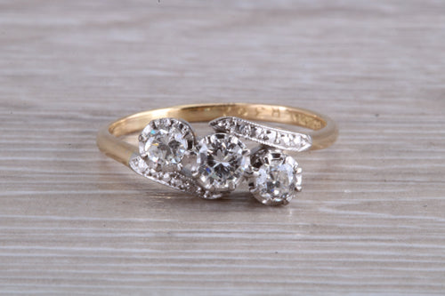 Half carat Diamond set Trilogy on a Twist Shank Ring