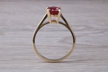 Load image into Gallery viewer, Two carat Oval cut Ruby set Yellow Gold Solitaire