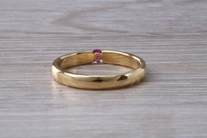 Tension set Natural Ruby Gold Band
