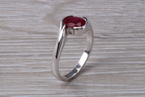 Oval cut Ruby set Crossover Ring