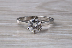Forever One diamond solitaire, One carat Charles and Colvard diamond set in six claw ring and made in your choice of precious metal