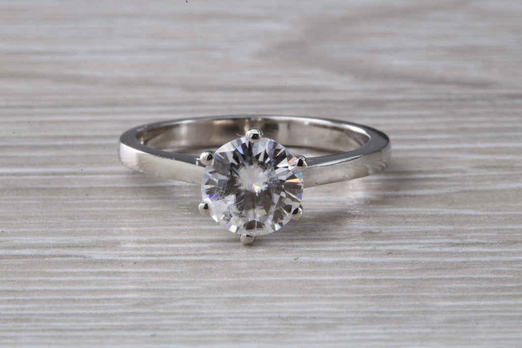 Forever One diamond solitaire, One carat Charles and Colvard diamond set in six claw ring and made in your choice of precious metal