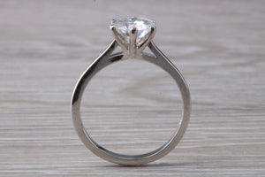 Forever One diamond solitaire, One carat Charles and Colvard diamond set in six claw ring and made in your choice of precious metal