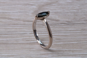 Marquise cut blue Sapphire ring set in 18ct white gold, half carat blue Sapphire