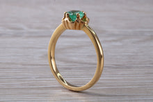 Load image into Gallery viewer, Half carat Emerald set Yellow Gold Solitaire