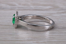Load image into Gallery viewer, Emerald and Diamond Halo set Platinum Ring