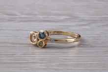 Load image into Gallery viewer, Multi gemstone set ring, 9ct yellow gold and set with bluse sapphire, green sapphire and yellow sapphireand diamonds