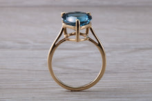 Load image into Gallery viewer, Heart shape London blue Topaz ring made from solid 9ct yellow gold with British hallmark, ideal dress or statement ring