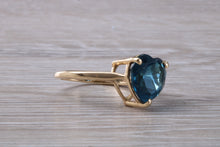 Load image into Gallery viewer, Heart shape London blue Topaz ring made from solid 9ct yellow gold with British hallmark, ideal dress or statement ring