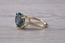 Load image into Gallery viewer, Heart shape London blue Topaz ring made from solid 9ct yellow gold with British hallmark, ideal dress or statement ring