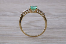 Load image into Gallery viewer, Dainty Oval cut Emerald and Diamond set Yellow Gold Ring