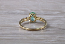 Load image into Gallery viewer, Dainty Oval cut Emerald and Diamond set Yellow Gold Ring