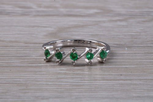 Dainty Emerald and Diamond ring. very unusual styled band in 18ct white gold