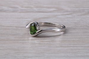 Oval cut Green Sapphire Crossover Ring