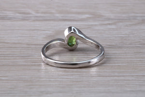 Oval cut Green Sapphire Crossover Ring