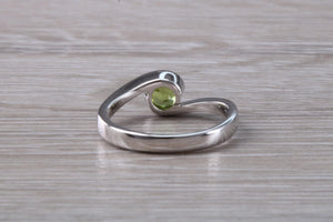 Half carat Peridot set 18ct White Gold Ring