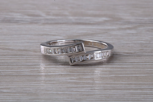 Crossover Baguette cut Diamond set ring