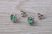 Load image into Gallery viewer, Emerald and Diamond Halo set 18ct White Gold Stud Earrings